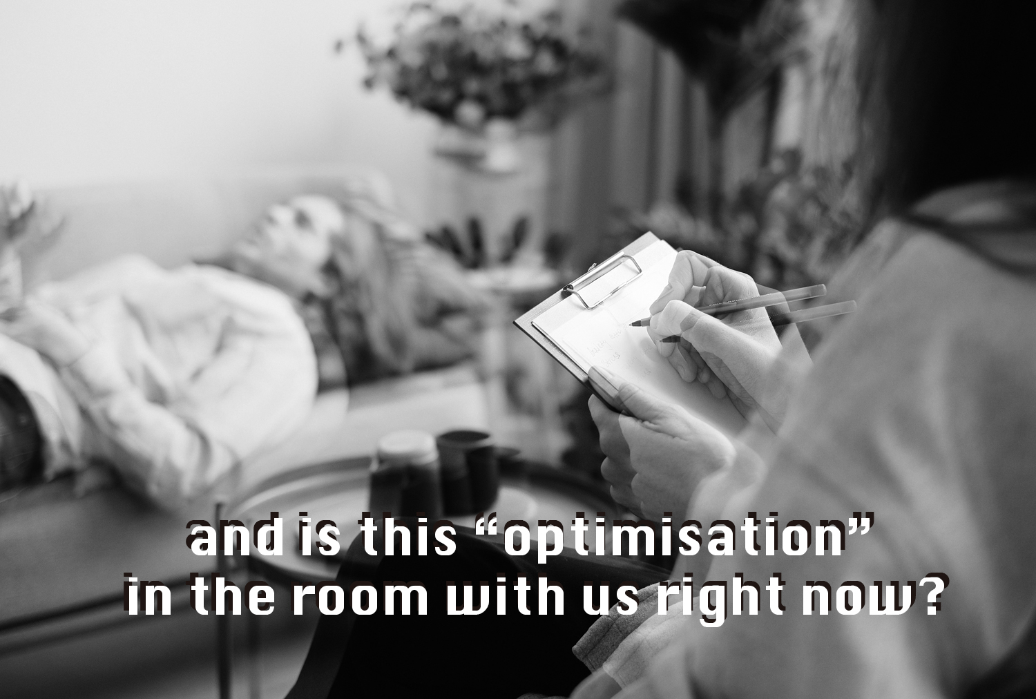 A person lying on a therapist bed with the words "and is this "optimisation" in the room with us right now?" overlaid