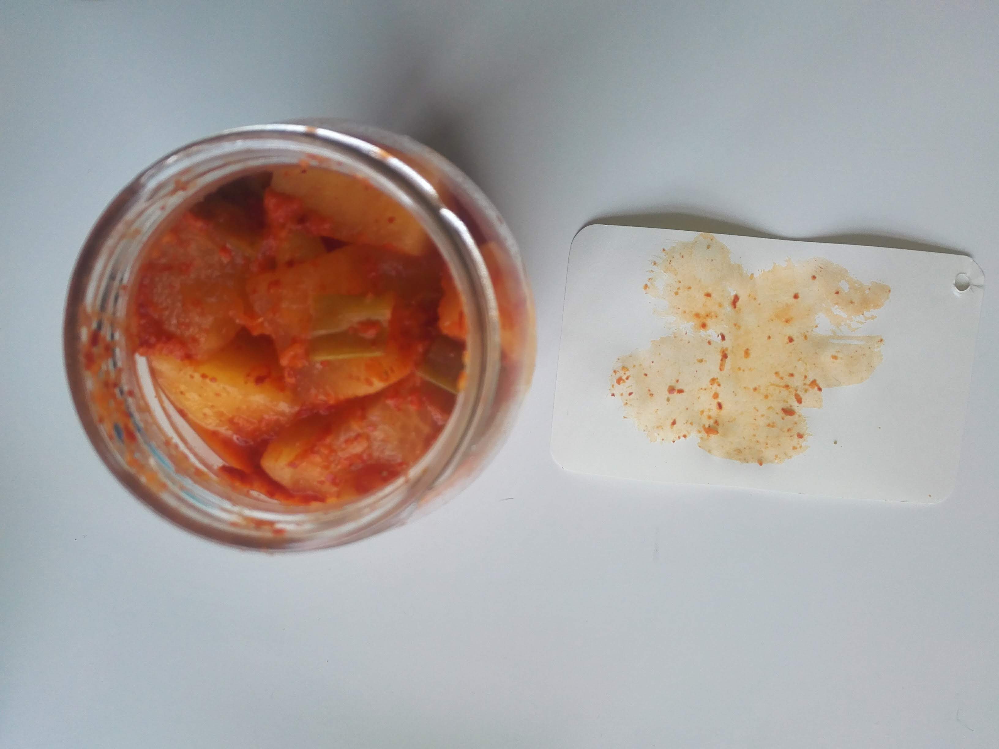 photograph of kimchi in a jar